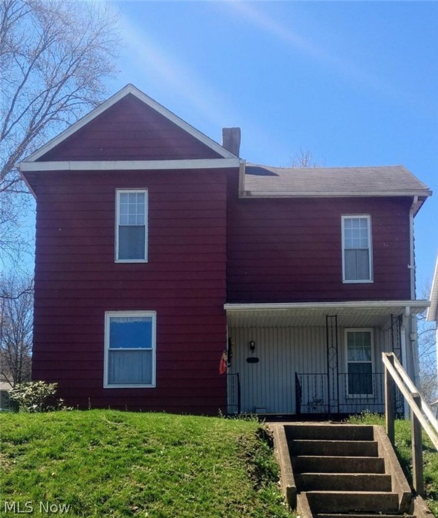 Very cozy home with large spacious rooms. All three bedrooms have cable and phone jacks. Many of the updates have been done within the last 10 years which include a new Trane Furnace, Hot Water Tank, 200 AMP Electrical Box and Windows. All new electrical wiring ran in 2014. Below the carpeting upstairs you'll find all original hardwood flooring. Walk in the front door to your living room and off to the right is a sitting room or family room that could be used as a 4th bedroom. Laundry hookup on main floor. Off street parking in the rear of the house. Owner is selling as is