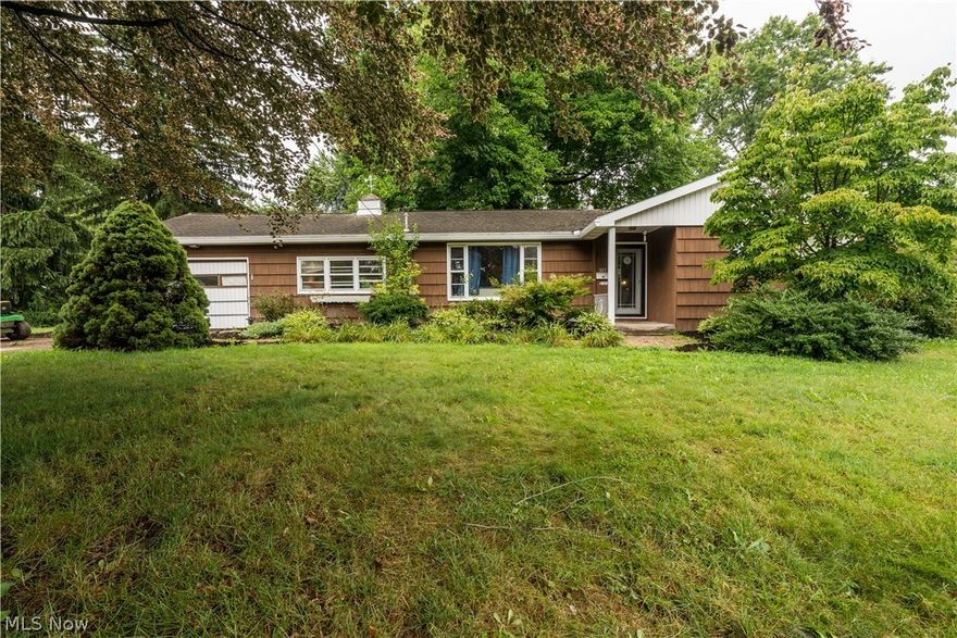 This cozy ranch in Perry features 2 bedrooms and 2 full baths on just over a half-acre lot.  The kitchen appliances as well as the washer and dryer convey with the home. There is a covered porch measuring 28x10 and a brick patio in the rear.  A spacious breezeway connects the home to the one car garage. The basement has a finished full bath. Also in the lower level is a space that was started to be renovated as a 3rd bedroom, and could easily be finished. A shed in the back is ideal for extra storage. Book your showing today!