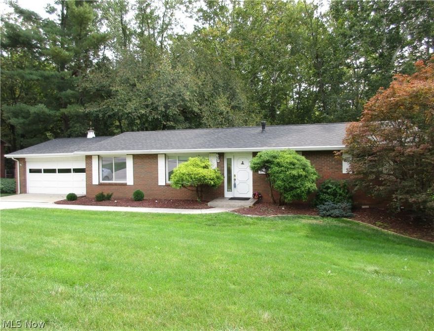 Many recent updates to this nice 2,412 sq. ft, one-owner brick ranch on a desirable street in Devola.  Brand new neutral carpet just installed on the first floor!   Wallpaper removed and freshly painted.  Brand new deck just constructed with access from the family room!  This potentially 5 bedroom home is within walking distance to Putnam School and offers a spacious living room, formal dining.  Kitchen and baths feature ceramic tile floors.  Open concept living in kitchen/family room.  The master bath has 4' shower and main bath has double bowl sink.  Lower level offers 2 bedrooms, large laundry room, a storage room with rear access, and a huge rec room with walkout access.  Brand new roof, newer 200 amp service newer HVAC and stamped concrete driveway and sidewalk.  Partially fenced backyard leading to wooded privacy on this nearly 1 acre lot.  Move in ready convenience!    M140KL