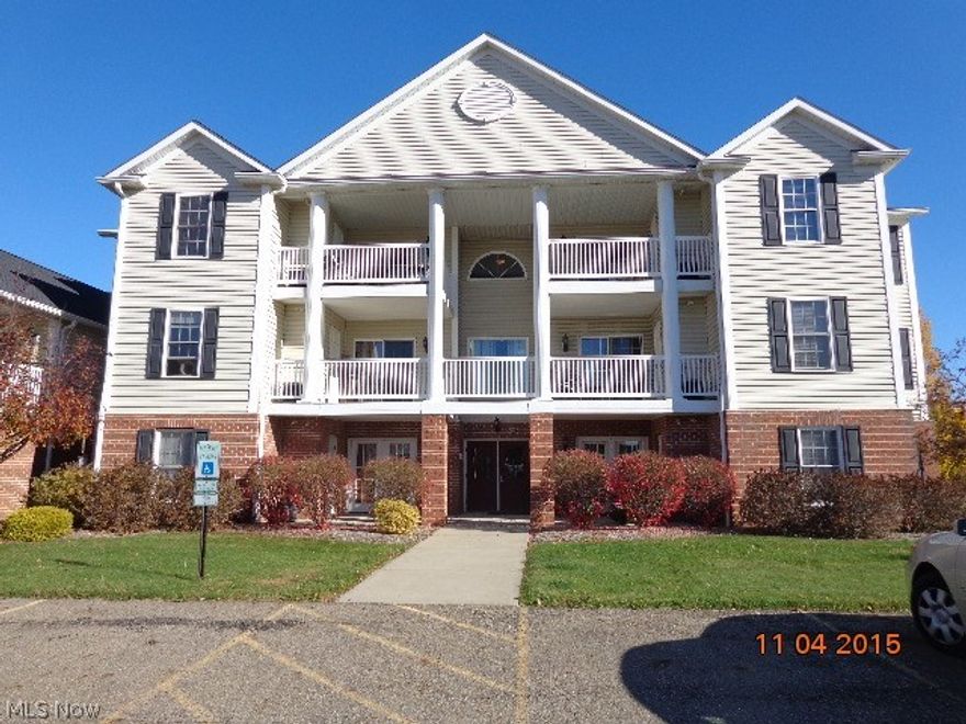MAINTENANCE FREE LIVING. Condo with 2 bedrooms, 2 full baths at Hampton Court. Wood laminate flooring throughout. Large living and dining area. Walk in closet in master suite. Laundry closet. Private balcony. Garage. Great location. Call for private showing.