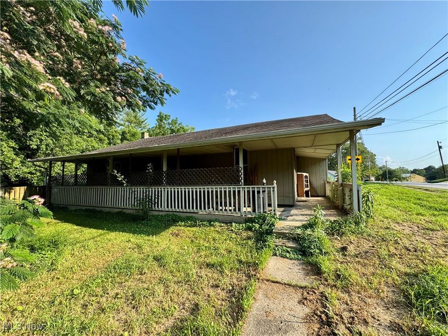 This 2-bedroom, 1-bath home on nearly 1 acre along State Route 13 in Athens County offers plenty of potential! With over 1,100 sq ft, a covered wraparound porch, and multiple outbuildings - including a detached garage and a chicken coop - this property is just waiting for the right buyer to bring it back to life.