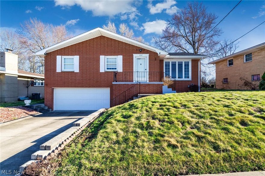 OPEN HOUSE SUNDAY AFTERNOON FROM 1 - 3! Location is everything, and this well-maintained all-brick raised ranch delivers. Conveniently located at 217 Lorraine Drive in Weirton, just minutes from the Route 22 / Colliers Way exit, this home offers easy access to shopping, dining, and commuting routes.
Pride of ownership is evident throughout this meticulously maintained property. The main level features three spacious bedrooms, each offering double closets with built-in lighting, along with a full bathroom. The home also includes a second full bath in the lower level.
The finished basement provides a large rec room, perfect for entertaining or additional living space. A two-car integral garage offers convenience and extra storage.
Outside, the backyard includes a patio area and storage shed, providing great space for relaxing, gardening, or outdoor gatherings.
A solid brick home in a highly convenient location — this is one you won’t want to miss!