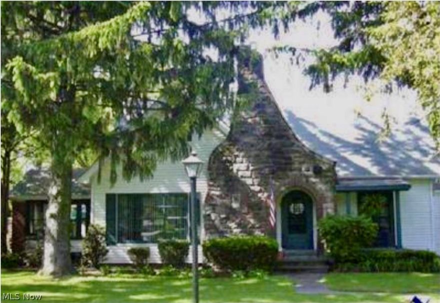 Charming updated Cape Cod on over a half acre. This lovely home has been updated, has a large eat-in kitchen with a walk-in pantry, beautiful hardwood floors throughout, high ceilings and lots of original wood trim including crown molding. The family room has an impressive original stone fireplace, the over-sized dining room that is currently used as a children's playroom has a built in china cabinet. This home also features a peaceful enclosed sun porch, a secluded patio with a fireplace, a 2-car garage, a large private yard, tons of storage, a partially finished basement with lots of storage, updated bathrooms and a bedroom on the first floor. This home is in the award winning Brecksville-Broadview Hts City School district.