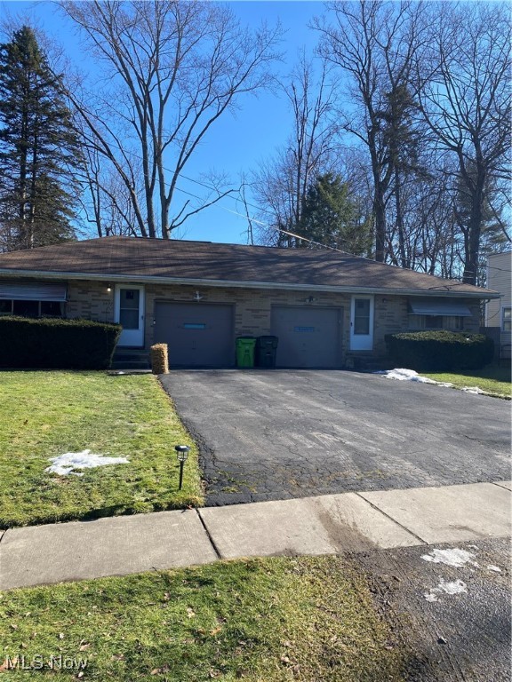 Ranch plex, 2 Bedroom each side. Full basement, one car garage each. Fenced rear yard, patio