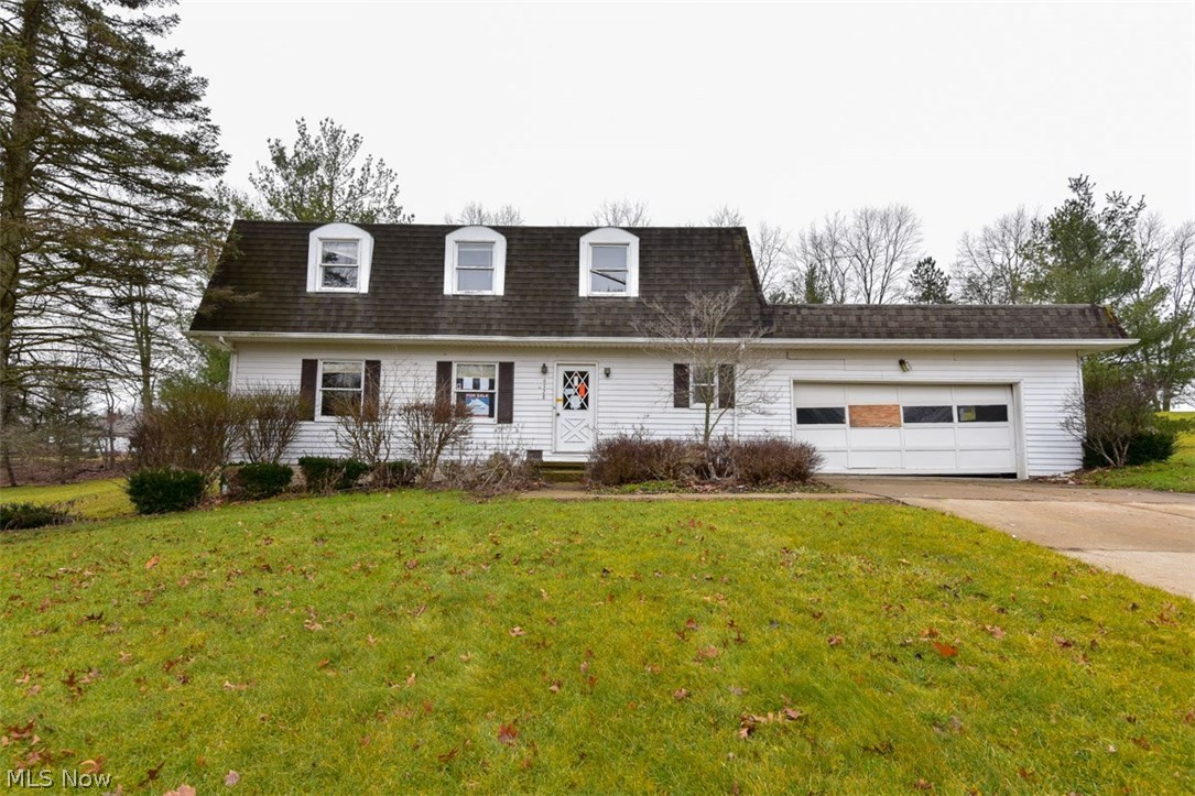 1972 Cape Cod in the Heritage Heights subdivision offers 4 bed, 2.5 bath, with approximately 2475 square feet of living space plus a full basement, and an attached 2 car garage. The home is situated on about half an acre. Some of the features include wood flooring, neutral paint, and good natural light. The basement has the potential to be a second living area or rec room. Bring your design ideas and see what you can do here.