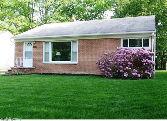 Hard to find one floor living Neutral decor throughout. Large combination living room/dining room with large picture window with vertical blinds. Kitchen has an abundance of cabinets, pantry, eating area, gas and electric stove connection, vinyl flooring, double sink and so much more. Larger bedroom has a double closet, carpeted, and a large private 1/2 bath. The remaining bedrooms are roomy with large double closet and carpeted. The lower level offers a partially finished basement, as well as a combination Laundry/Utility Room with built in storage and a large utility tub. The detached 2 car garage is updated with separate electric box and automatic garage door opener. There is a cement patio in the rear yard with a built in gas grill for those cookouts. Some amenities include brick and aluminum exterior, park like setting, central air, window treatments throughout, freshly painted interior and ready to move in.