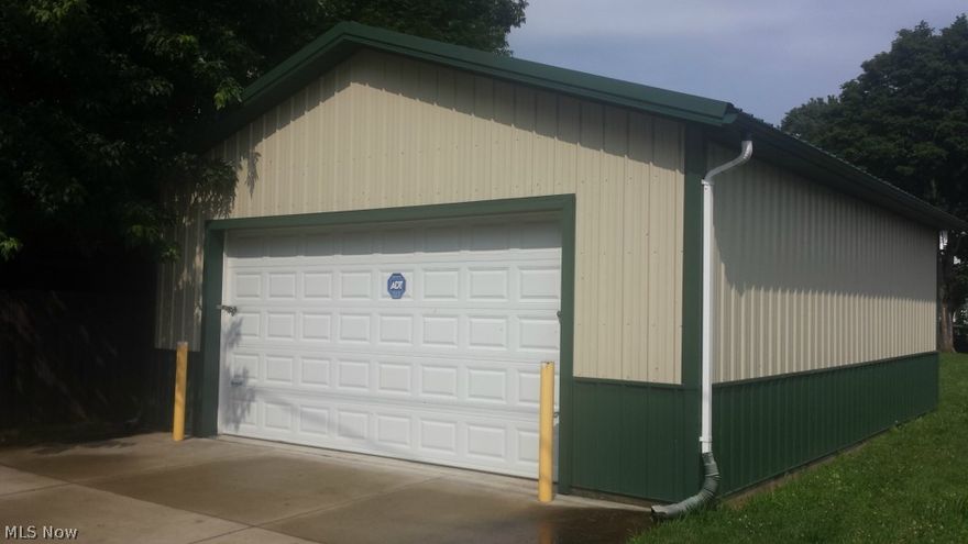 Great central location for storing your toys! Newer 24 x 32 pole building with cement floor and a 8 x 16 door on a 33 x 120 city lot in downtown New Philadelphia. Nice lot to build a small rental and keep the garage for yourself.