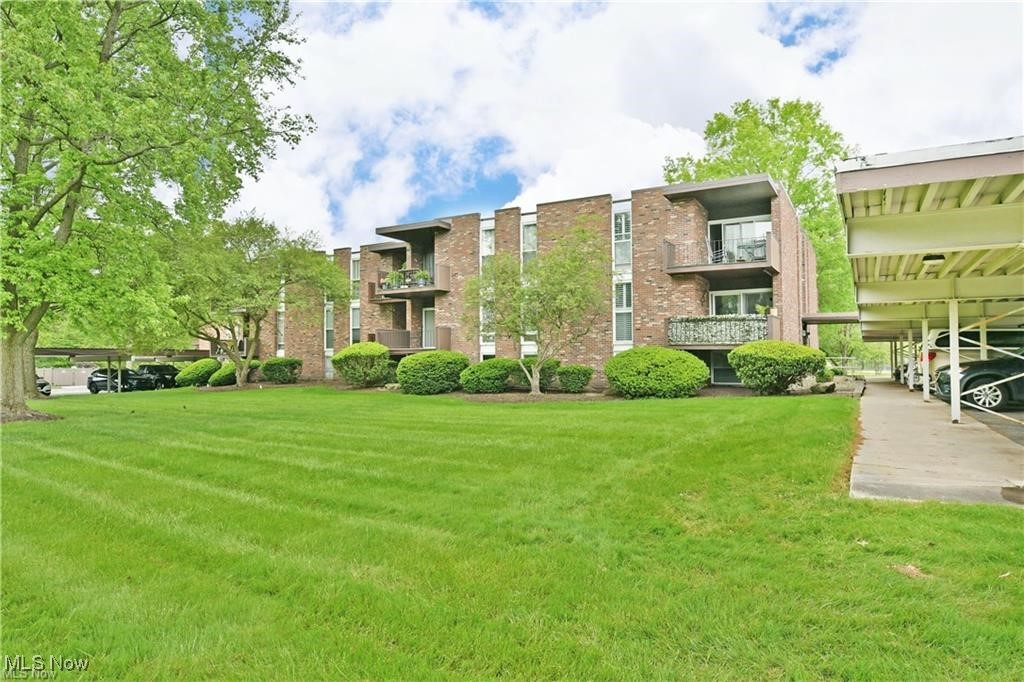 Beautifully updated 2 bedroom condo in Howland Schools! Enjoy maintenance-free living with this open floor plan featuring a spacious living room with plenty of natural light, dining area, and a convenient kitchen with new stainless appliances. The full bath is shared with the spacious owner's suite and second bedroom. Sliding doors lead to a roomy, private terrace overlooking the pool! There are numerous updates including flooring, paint, lighting, bathroom update, vinyl sliding door, and more! Terrace North features beautifully maintained grounds and an in-ground pool for your enjoyment! A covered car port and extra company parking area is included as well. HOA includes water, heat, trash & snow removal, and use of pool, with available cable and internet. Shared laundry facilities are on the premises for your convenience.