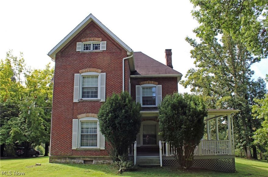 A RARE FIND WITH A BRAND NEW ROOF-DECEMBER 2020!  This distinctive country estate located in Wellsburg, WV provides a rare opportunity to own an enchanting property with charm galore. Close to Pittsburgh, PA, and Wheeling, WV. Situated on over 11 acres in a park like setting, this home was well-loved and cared for.  The warmth of the extensive 3 BR, 3BA 2 story brick is undeniable in the formal dining room boasting custom bookshelves, the large welcoming foyer and three fireplaces.  You'll enjoy the manicured yard while sitting on the wrap-around porch. The massive 2 story 60 x 40  garage will meet the needs of any car enthusiast or collector.  Has a full second floor with endless possibilities for anything you can imagine, an apartment, classroom, storage, you name it. You must see to believe all this property offers, so make an appointment to view today!
