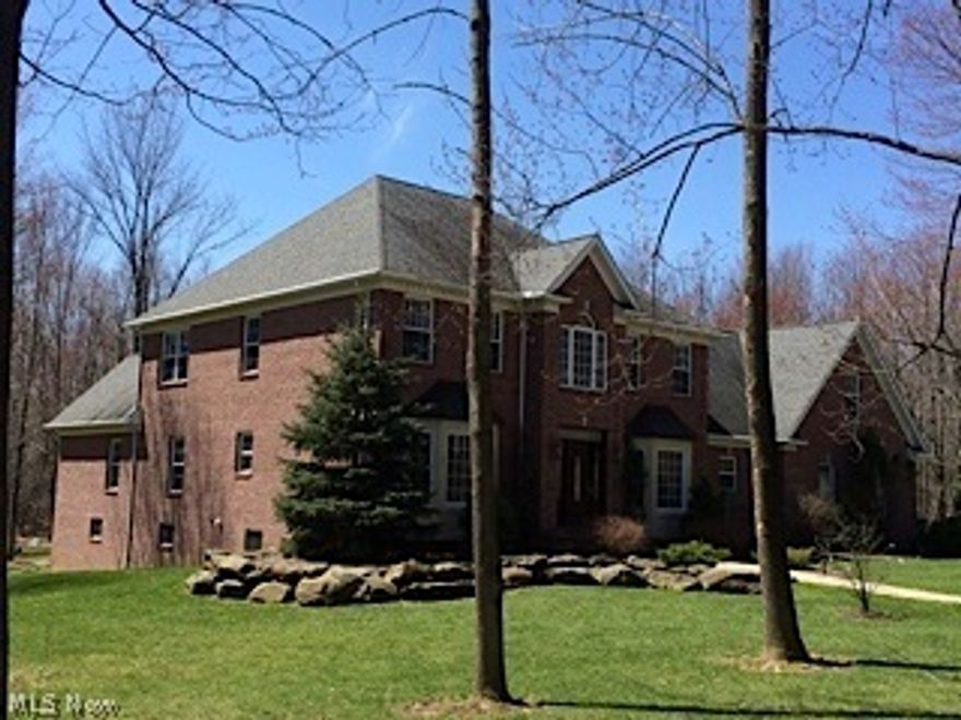 Elegant living in Olde Taylor woods 4/5 bedroom, 3 1/2 bath colonial on 2.68 landscaped wooded acres. Begin your journey at the columned central Foyer with marble floor which leads to formal tray ceiling Dining Room, formal Living Room and cathedral Great Room with Brazilian cherry floors, open staircase with 8x8 balcony , 2 story full wall stone fireplace and window walls looking out onto unique 3 tiered stone Patio. Gourmet Kitchen has cherry floors, granite counters, custom cabinets and all newer top line stainless appliances. First floor Master Suite features French Doors to patio and impressive Glamour Bath with whirlpool tub, double sinks and shower.  Second floor has 3 family Bedrooms and 2 Baths with adjoining large Bonus room and second staircase leading to the eat-in kitchen. Audio System, Security System & Central Vac.  Walk out basement will conclude your journey through this exquisite home.