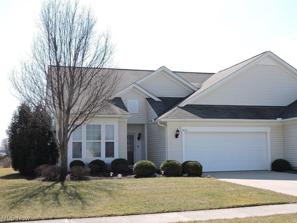 Open floor plan Ranch home in Ohio's premiere "Del Webb" community! The Great room features a gas fireplace & a formal dining room. Relax in the bright & cheery four season sun room. The large Master bedroom suite has a "walk in" shower & walk in closet. There is a second bedroom with a full second bathroom. All kitchen & laundry room appliances are included. Special features include extra large windows, hardwood floors in the foyer, fans, 9' ceilings & premium window treatments throughout. The homes exterior includes a 10x19 concrete patio, sun awning, irrigation system, & a 20x21 garage with insulated garage door & opener. Come & enjoy the Lodge with indoor & outdoor heated pools, hot tub, fitness center, card & party rooms, pickleball, shuffleboard, & bocce courts & walking trail. Join one or more of the numerous clubs & interest groups. The full time lifestyle Director plans bus trips, educational speakers, exercise classes & many other activities on a weekly basis.