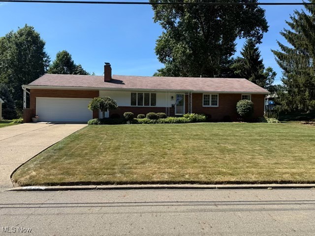 Welcome to 1935 Stoner Ave. NE in beautiful Massillon Ohio. Don't let this home fool you it is older but is in amazing shape for its age. This beautiful brick ranch features 3 bedrooms, 3 full baths encompassing nearly 2000 square feet of living space. On the main floor there is a very spacious living room with newer carpet, fireplace, can lighting, and a huge window that casts a ton of natural light. As you make your way into the eat in kitchen, you will see it has been well maintained over the years. Fully equipped with a cook top, double built in over, refrigerator, dishwasher and newer floors that were installed 5 years ago. There is plenty of counter top and cupboard space for all your cooking and baking needs. There is also a dining area that can fit a full sized table with no problem. As you make your way down the hall you will see two bedrooms of decent size both with newer flooring and a full bathroom across the hall. There is a large master suite with newer flooring, nice closets and a full bathroom. There is a full basement with the washer and dryer to stay with the sale of the home. In the basement there is a little workshop area, locker room style full bathroom, and plenty of storage on the one side. The other side is a large area that is finished that features a fireplace, and a bar for all your entertaining needs. The outside of the home is absolutely immaculate. It has a beautiful lawn and the flower beds and shrubbery are very well manicured. There is a very nice covered back porch with a patio area, small privacy fence and a built in grill. This home is gorgeous inside and out, come take a look before it's too late. Call to schedule your private showing today.