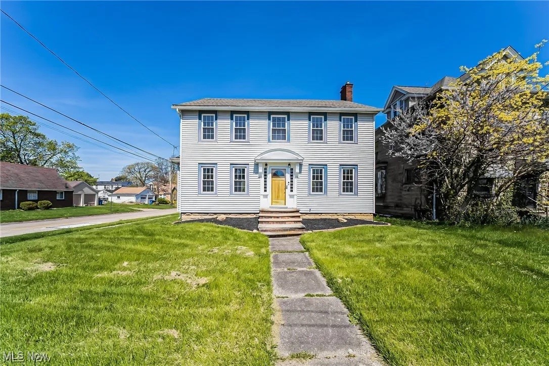 This property qualifies for OFHA down payment funds of 5% equalling 15,000 dollars. Seller is BUYING DOWN THE INTEREST RATE TO AS LOW AS 4.99% for qualified buyers. The property also comes with a TEN YEAR REAL ESTATE TAX ABATEMENT. Welcome to a piece of living history just 5 minutes walking distance to Lakeview Park, Lorain's beautiful lakefront beach! This meticulously restored historical residence seamlessly blends old-world charm with modern day amenities. Once the home of famous local architect, Henry O Wurmser, originally built in the 1840’s this home has played a role in the city’s rich history. This residence showcases stunning architectural style and craftsmanship with ornate detailing. Every inch of this residence has been thoughtfully restored from the original red oak hardwood floors, custom balusters, trim and doors. The kitchen and bathrooms have been fully remodeled with high quality materials offering charming spacious areas. A patio under the tree is ideal for al fresco dining, flower beds for gardening, spacious deck and patio invite you to unwind or entertain in a secluded setting with lake views. New central air conditioning, furnace, electrical and plumbing provide the best of modern living while preserving the integrity of the original structure. Seller is willing to remodel second structure to buyers specifications, install new garage and driveway at an additional cost and to provide seller concessions. Ohio Historical Society Registration # LOR 756-16. You do not require permission from Ohio Historical Society to remodel the property. Inspection Report is available upon request. You can own this home for as little as 1,574 per month.