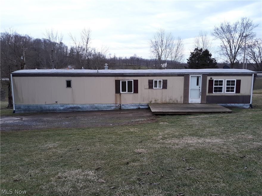 Great investment opportunity!  Check out this 2 bedroom, 1 bathroom single-wide trailer in Old Washington.  This home has everything you need on one level including an eat-in kitchen that is open to the living room.  This home has a newer Furnace and Septic tank.