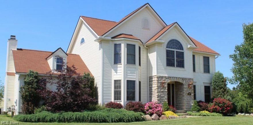 Impressive custom Curran-built. Meticulous one-owner home. 2694 sq ft of quality custom construction. Foyer & formal dining feature custom red oak flooring.  Greatroom features vaulted ceilings, gas log/woodburning fireplace. Gourmet kitchen boasts quality Italian porcelain counters, backsplash and center island, generous oak cabinetry. Appliances negotiable. 1st floor laundry. Versatile floor plan offers up to 5 bedrooms (currently 3 bedrooms plus first floor craft/sewing room and 2nd floor office - both could be bedrooms. Second floor office tandem to Master could also be sitting room or nursery. Master bath features double sinks, oversized soaking tub, separate walk-in shower and walk-in closet. Custom draperies and curtains throughout. Some fresh paint and new carpet.  Basement stubbed for full bath. Eating area opens to a stunning 30 x 16 paver patio featuring a live hydrangea wall and Pergola with custom fabric shades. 3-car garage.  More than a half acre lot is professionally la