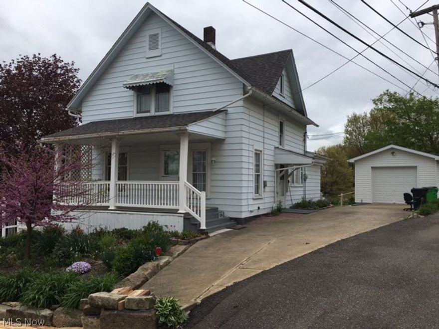 Cute and well-kept home located in historic Sugarcreek. Many updates including roof, furnance, A/C, electric, some new windows. 1st floor master bedroom with full bath and laundry. Finished lower level features an additional living suite with separate entrance. This home has been used as a bed & breakfast.