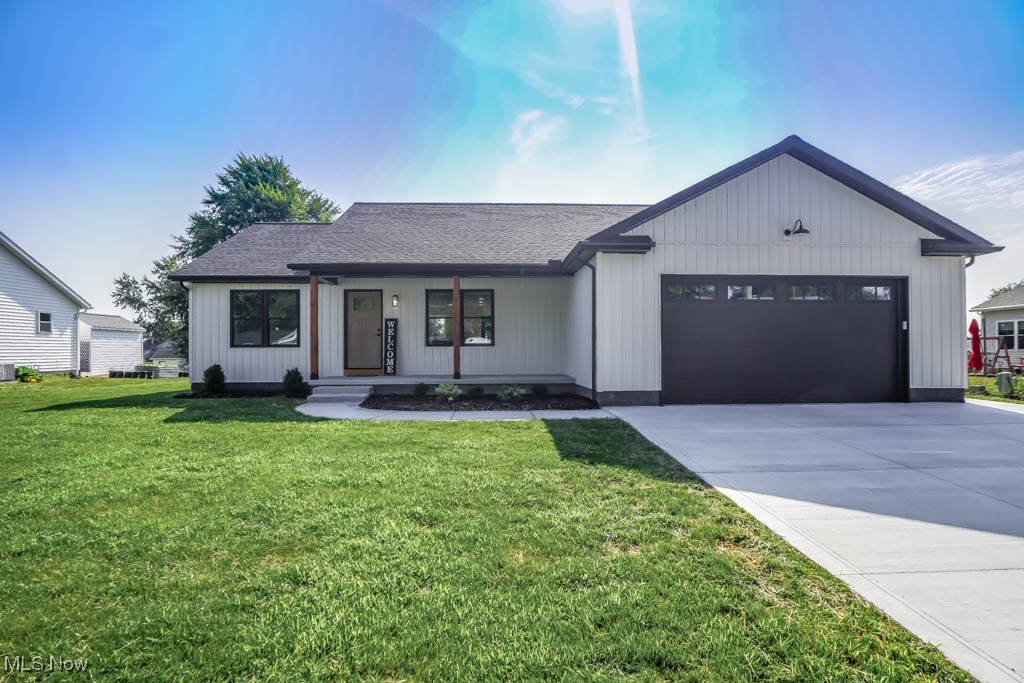Brand new 3 bedroom, 2 full bath ranch with a finished lower level! This quality-built home offers an open floor plan that combines the living room, dining area, and cook's kitchen featuring quartz countertops, a subway tile backsplash, Shaker cabinetry, a walk-in pantry, and a 6-foot center island with counter seating. Luxury vinyl plank flooring extends into the mudroom entry from the attached two car garage, which includes hot and cold water and an 8-foot overhead door, and continues into the first floor laundry tucked behind a pocket door. The split bedroom design places the master suite on one side, offering a walk-in closet and a private bath with a tiled shower with a built-in bench and a double sink vanity. The opposite side features two secondary bedrooms with double closets and a full bath with a tub and shower. The 12-course lower level rec room, finished with new carpet and an open joist ceiling, is perfect for game and movie nights. Notable upgrades include Troyer doors, 200 amp electric, a 50 gallon hot water tank, and a 95% efficient furnace. Skip the wait for new construction, this brand-new home is ready for you. Call today!