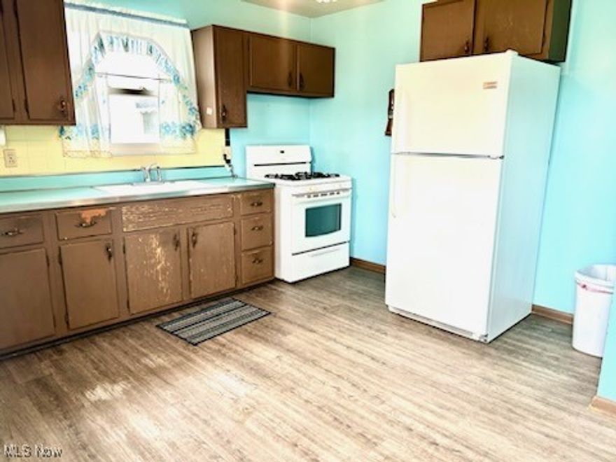 Welcome to this 3 bedroom Capecod that features original hardwood floors & a new furnace. This Home sits on a nice size lot located Close to restaurants, markets, parks and Willowbeach. The second floor has two bedrooms that are unfinished.
With a little TLC, this home could be adorable.