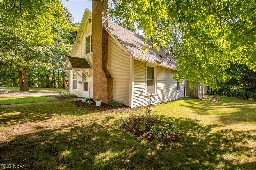 Completely Updated 1.5 Story *GEM* in Cuyahoga Falls, Such a Rare combination of Updates and Affordability will surely go Quick in Cuyahoga Falls! Enter the rear of the home, past your Elegantly Lit Patio, in to the Eat-in Kitchen, Highlighted by New Cabinetry, Countertops, Tile Backsplash AND Flooring! A Beautiful Garden Window Lets in an Abundance of Natural Light. Off the Eat-in kitchen is the 1st Floor Bedroom outfitted with Fresh Hardwood Flooring, continue down the hall where you'll find the Full Bath, and just beyond that is the over-sized Living Room, spanning the width of the Home! The Living Room flaunts Newly Refinished Hardwood Flooring and a Beautiful Fireplace! Upstairs You'll Find the other 2 bedrooms, complete with Plentiful Closet Space, Brand New Carpet, Doors, and a Fresh Coat of Paint. Boiler Replaced and radiators updated in 2016, H2O Tank replaced in 2017, Roof and Windows replaced 2007, Siding 2006 (Dates Approximate). Just blocks from Metro Parks, Shopping, Dini