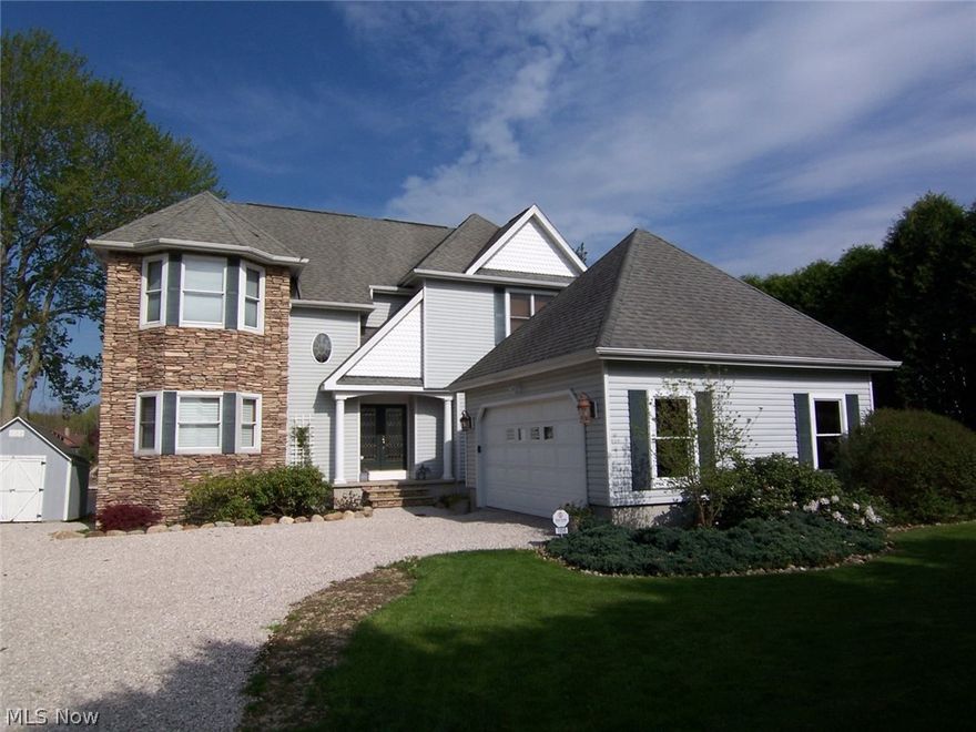 Gorgeous lakefront home with all the amenities! Gorgeous location on lake Roaming Shores and gorgeous views of lake Roaming Shores. 2 story foyer and living room, big private master bedroom with huge master bath and walk-in closet, formal dining room, large kitchen with a very quaint eating area overlooking the lake, and a big stone fireplace in living room with double doors out to deck overlooking lake Roaming Shores. Upstairs has 2 good sized bedrooms, a full bath and a nice room that could be either bedroom or office. Both bedrooms and office have tons of storage. The lower level is a full walkout lower level with nearly 10 foot ceilings and plenty of room for everyone. There's a big family room, a big bar, a pool table room, a sitting area great for table games, and another room for whatever you want! All overlook the lake.  There is a great covered outdoor seating/lounging area where you walkout from the lower level and then you can start to experience the Roaming Shores lakefront