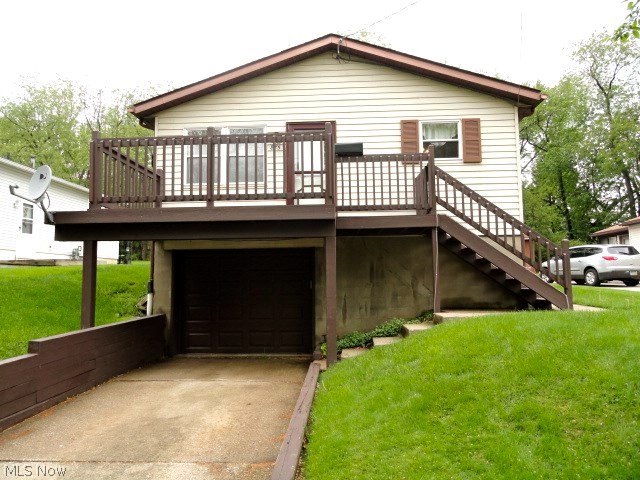 Well kept raised ranch with newer windows, attached garage, and fully fenced in back yard. New carpet and paint in living room. Clean kitchen with good counter top space. New carpet in master bedroom. Newer flooring with double glass door to back deck in third bedroom. Finished lower level room great for extra living area or rec room. Updated bathroom. Newer furnace, A/C, and hot water tank.