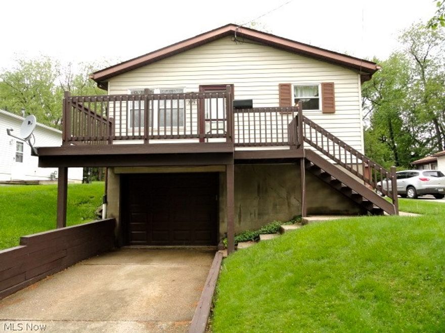 Well kept raised ranch with newer windows, attached garage, and fully fenced in back yard. New carpet and paint in living room. Clean kitchen with good counter top space. New carpet in master bedroom. Newer flooring with double glass door to back deck in third bedroom. Finished lower level room great for extra living area or rec room. Updated bathroom. Newer furnace, A/C, and hot water tank.