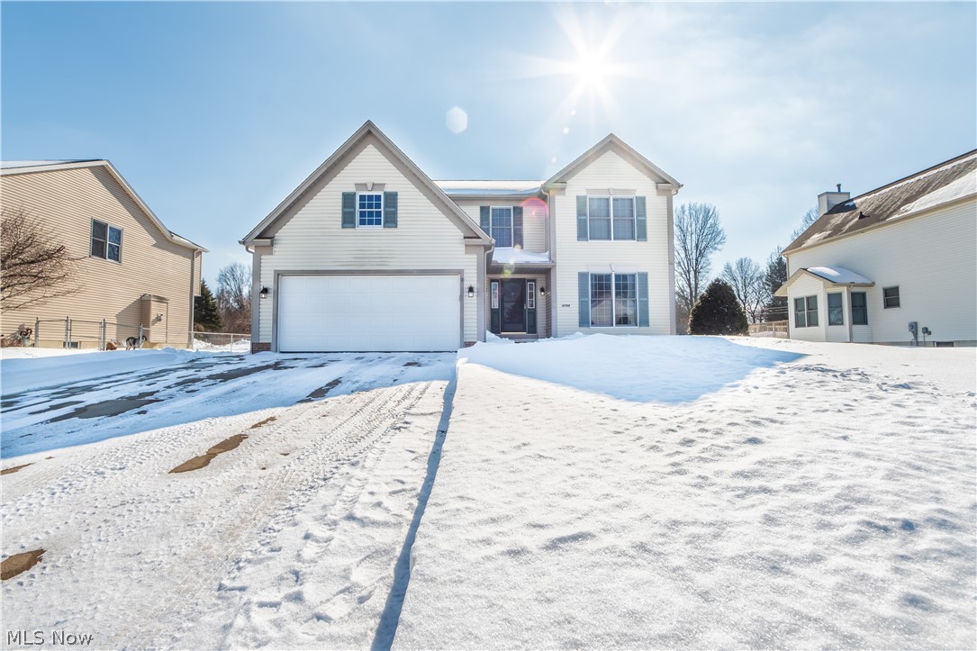 Welcome home to this well kept conventional style home in Rootstown. Through the front door, you enter into the oversized kitchen with plenty of cabinets and a large walk in pantry. The eat in kitchen opens up to the spacious living room where you can stay warm and cozy this winter relaxing by the fireplace. Fresh new carpet has been installed through out the home as well as new vinyl style flooring. This home also has a fresh new look as it has been painted throughout. There is an additional room on the first floor as well as a half bath. Upstairs, you will be greeted by the large master bedroom with vaulted ceilings with attached master bath with a soaker tub and separate stand up shower. Upstairs has three nicely sized bedrooms along with an additional full bath. In the basement, you can have a bonus living room and plenty of room for storage. This home is just waiting for its new owners, call me today to schedule your showing and make this home yours !