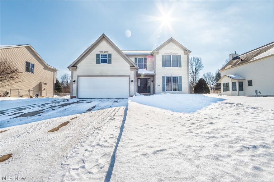 Welcome home to this well kept conventional style home in Rootstown. Through the front door, you enter into the oversized kitchen with plenty of cabinets and a large walk in pantry. The eat in kitchen opens up to the spacious living room where you can stay warm and cozy this winter relaxing by the fireplace. Fresh new carpet has been installed through out the home as well as new vinyl style flooring. This home also has a fresh new look as it has been painted throughout. There is an additional room on the first floor as well as a half bath. Upstairs, you will be greeted by the large master bedroom with vaulted ceilings with attached master bath with a soaker tub and separate stand up shower. Upstairs has three nicely sized bedrooms along with an additional full bath. In the basement, you can have a bonus living room and plenty of room for storage. This home is just waiting for its new owners, call me today to schedule your showing and make this home yours !