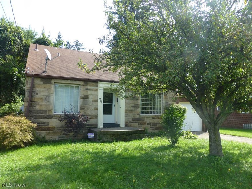 Charming and adorable brick and stone Cape Cod waiting for someone to call it home.  Large eat in kitchen with sliders to a back deck that you won't believe! It's the length of the house!  Gorgeous hardwood floors in the living room with a gas fireplace along with 2 bedrooms and a bath to complete the first floor.  Upstairs is the Master Bedroom with new carpet and lots of storage. Basement features a rec room with a bar and fireplace and also a separate laundry area. Glass block windows, windows replaced, hardwood floors refinished, fresh paint, newer carpet downstairs, brand new carpet upstairs, hot water tank replaced and waterproofed basement.   Immediate possession is available so why wait, Call today.