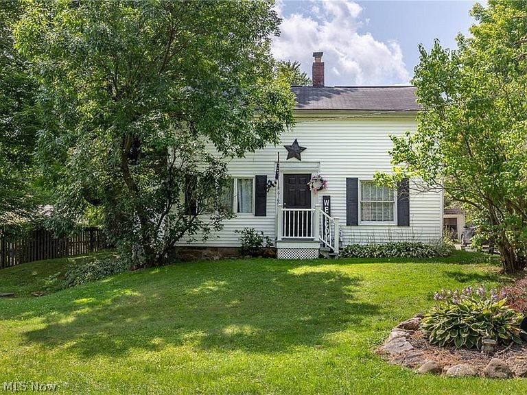 What an amazing opportunity to own your own home in Hiram! (Crestwood School District) This cute home has been well taken care of, enter through the front door to be greeted by a large living area, with office area/ additional bedroom to the side. Full bath located on first floor with tub, and Large eat in kitchen area, with ample countertops and cabinet space. Appliances to stay with home, washer and dryer tucked away off of side entrance, and Oversized first floor family room with vaulted ceiling complete the lower level. Upstairs youll find 3 bedrooms, including large master suite. Plenty of yard space, and detached one car garage compliment the home. This one is priced to sell, call today before this one too is SOLD. Home warranty included!