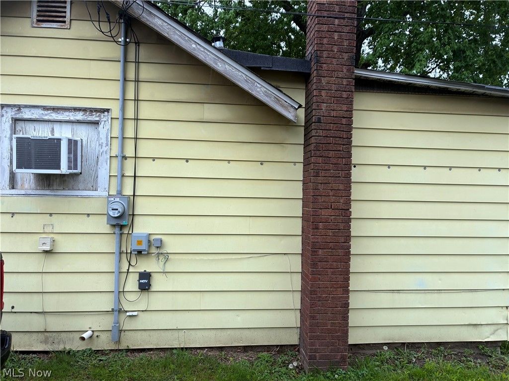 Photo of 134 Harmon Avenue NE, Brewster, OH 44613 (MLS # 5206694)