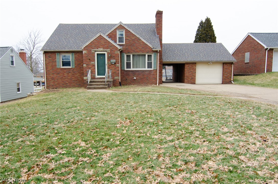 Solid brick home with wonderful updates! Conveniently located between Whipple Ave and 77 and just around the corner from Myers Lake. Meticulously clean and well kept home. Front entry way has wood floors and two coat closets. The living room is brightly lit with sunshine from the large front window. Offers a wood burning fireplace and beautiful oak mantel. Eat-in kitchen provides a spacious work area, lots of storage, garbage disposal, dishwasher, range and refrigerator. There are 2 bedrooms and a full bath on the main level as well. Up to the second floor to the master bedroom. This extra large room has beautiful hardwood floors, a charming nook to read or relax, high ceilings, 2 ceiling fans, closet and additional attic storage access! The side door from the kitchen leads to the wide breezeway out to the garage. What makes this home extra special is in the basement. Massive finished recreation room, with a kitchenette equip with tons of counter space, sink and mini fridge