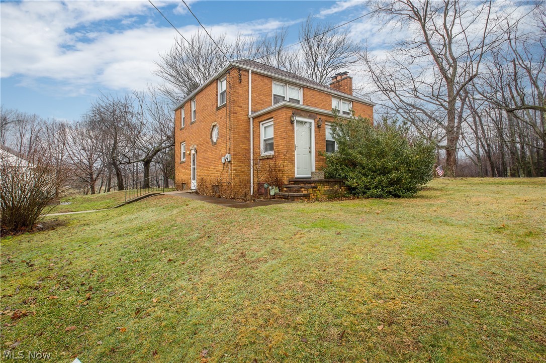 All brick, 2 story home with 3 bedrooms and over 1500 sq. ft situated on over an acre in Lake Schools! You will love the living room featuring a large bay window, gas fireplace and hardwood floors underneath the carpet. The dining room has 2 built-in corner hutches plus extra built-in storage space and it's open to the kitchen. In the kitchen, you will find plenty of cabinets, tons of counter space, and a breakfast bar. Head upstairs to the 3 bedrooms, each with hardwood floors and a good amount of closet space. The full bathroom is also on the 2nd floor and features a tub/shower and a single pedestal sink. Adding to the appeal is an oversized detached 2 car garage with newer garage doors (2017) and attic space for additional storage. Some updates include a newer roof, furnace, and AC all within 5 years. Conveniently located right off of 619 with easy access to Hartville Marketplace and Hartville Kitchen! Schedule your showing today!