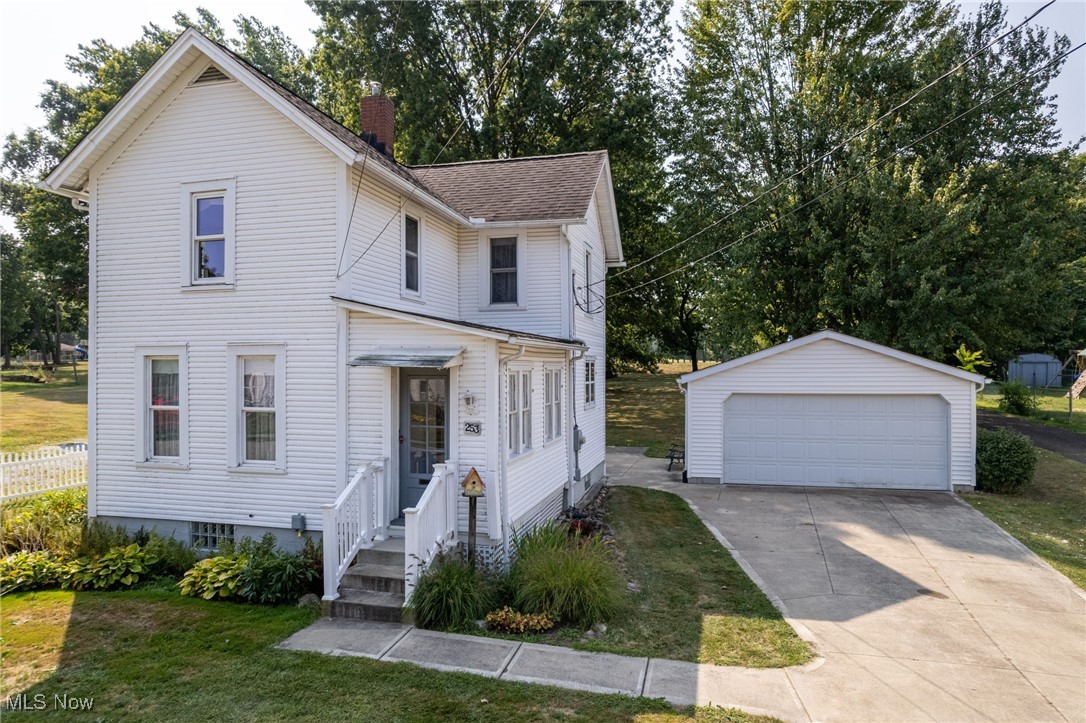 Welcome to 253 E. Bergey Street! This charming colonial style home has been lovingly cared for by the same owners for nearly five decades—and now it’s ready for a new chapter. Nestled on a quiet street in Wadsworth, this 3-bedroom, 1-bathroom gem offers timeless charm, solid craftsmanship, and pride in ownership that’s evident throughout. With 2 separate parcels, totaling over a half acre, this unique property boasts ample outdoor space, perfect for gardening, recreation, or future expansion. Enjoy the convenience of 3 storage sheds and an oversized 2 car garage, ideal for lawn equipment, tools, toys, etc. Nature lovers and park goers will appreciate the direct access to Old Bird Park, located just beyond the backyard—providing a peaceful, tree-lined backdrop and endless opportunities for outdoor enjoyment. Inside, the home features an inviting layout, complete with a spacious living area, practical eat-in kitchen, full bathroom and additional work/craft space—ideal for hobbies, projects, or extra storage. Both front and rear enclosed porches extend your living space and overlook the yard, providing great spots to unwind. Upstairs, you’ll find three comfortable bedrooms, all well-kept and ready to move into. The clean, unfinished basement offers plenty of storage and a spacious laundry area. Whether you're looking to settle into a move-in ready home or put your personal touches on a classic, this property is full of potential. Opportunities like this don’t come often so schedule your private showing today and see why this Wadsworth treasure has been cherished for generations! Selling AS-IS.