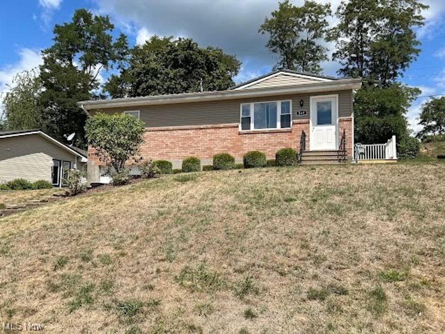 Our newly updated, charming three-bedroom, one-bathroom home. A perfect blend of modern amenities and classic comfort. This inviting residence offers a spacious and versatile living environment, ideal for relaxation, family living, and entertaining. Upon entering, you'll be greeted by a bright and airy open floor plan that makes the living room inviting and warm. The kitchen is thoughtfully designed to cater to all your culinary needs. It boasts a sleek flat-top stove, a dishwasher for easy cleanup, and a generously sized refrigerator. With ample counter space and cabinetry, the kitchen is both functional and stylish, perfect for cooking and hosting. The home features three well-sized bedrooms, each offering a comfortable retreat with ample closet space. The neutral color palette and abundant natural light create a serene atmosphere that can easily be personalized to fit your style. The updated bathroom is designed with both elegance and practicality in mind. Its contemporary fixtures and clean lines provide a fresh, modern feel, making it a pleasant space for your daily routines. One of the highlights of this property is the large basement, offering significant additional space that can be utilized as a storage area, a recreational room, or a workout room—whatever suits your needs. For added convenience, the home includes a washer and dryer hookup, making laundry days straightforward and efficient. The attached car garage provides secure, sheltered parking and additional storage options, ensuring that your vehicle and belongings are protected. With both gas and electric utilities, you'll benefit from efficient and reliable energy sources throughout the year. This updated home combines modern convenience with practical features, creating a comfortable and versatile living space that’s ready to welcome you. NO HUD. No Smoking. No Pets. Tenant responsible for all utilities.