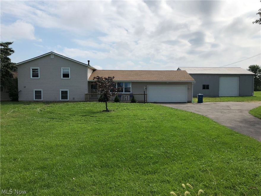 Don't pass up this opportunity to own a great home!  Beautiful Country living, spacious 5 bedroom, 2 bath home is move-in ready! Amazing Out Building 40x30 with a 12 ft. high door.  Home Warranty included!  Don't miss out on this great home! Schedule your showing today.