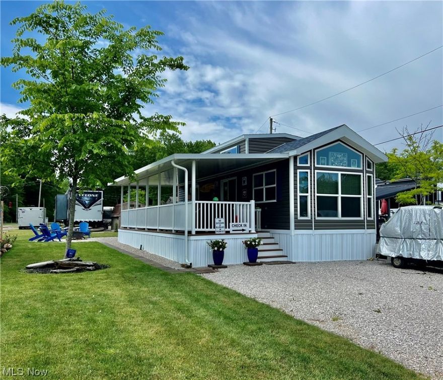 Lake Erie Geneva on the Lake on-site Glamping at its finest! Step into this 2020 Canterbury park model and be wowed! Selling furnished, this exceptional park model sits on a quiet 45x75 Lot in the rear of wooded Indian Creek Campground Cathedral ceiling & newly added 30x12 composite & metal porch. Inside, Stainless Steel appliances in the lovely kitchen adjoining Living Room w/big screen TV & electric fireplace. Just down the hall, more storage & large bath, queen master Bedroom with more built-ins. Up the lighted stairs to the loft w/queen and single beds & space enough to add more. 

Central heating and air with extra loft AC unit

All furnishings are top notch, and the outdoor living area is off the charts.  Beautifully furnished and high end including outdoor television, Grill and more. 

Nicely landscaped yard features composite Adirondack chairs, firepit & shed. 

Minutes from Geneva on the Lake, close to Ashtabula Harbor, Walnut Beach, Conneaut & area wineries. Less than