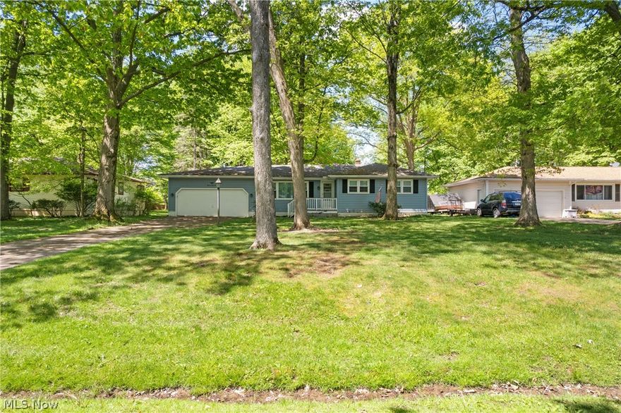 Welcome home to this cozy and clean ranch located at 1142 Gary Blvd in Brunswick. This darling ranch sits on a 1/2 acre lot on a secluded dead-end-street. The home consists of roughly 1200 square feet, three bedrooms, two full baths and a partially finished basement. Entering into the home, you land in the lovely living room offering a wood-burning fireplace, built-ins and tons of natural lighting. The dining area connects to the kitchen space making it easy to host. The kitchen offers ample counter space and cabinetry overlooking the wooded backyard. Three bedrooms share the first full bath. Hardwood flooring underneath the carpet. The lower level includes additional 420 square feet, a full bath, and woodwork shop perfect for crafting any masterpiece! Mechanicals are all in great condition, 90% efficiency furnace, vinyl windows, vinyl siding and three tab roof. Basement has been waterproofed by Ohio State Waterproofing. Exterior includes private wooded lot with a shed. This ONE OWNER home since 1961 is awaiting it's new owner! Call/text for your private showing today!