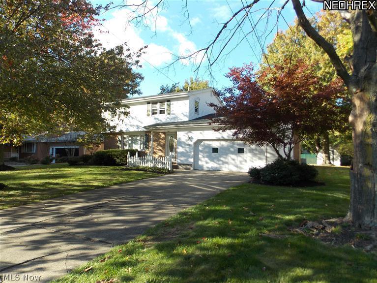 4 Bedroom House in Applewood Acres. Screen in sun porch. Newer tile in baths, Hardwood Floors in family room.