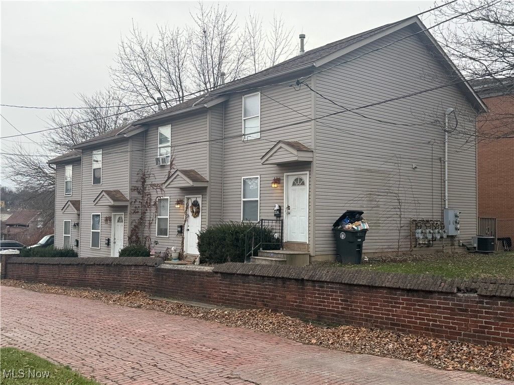 Photo of 642 E Buchtel Avenue, Akron, OH 44304 (MLS # 5176517)