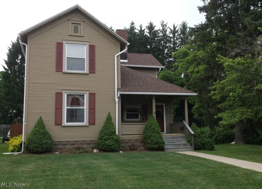 CLOSE TO SCHOOLS!  This 3 bedroom, 2 bath home on nice double lot is move-in ready.  Offering many updates including newer bath, windows, 200 amp service, furnace/air and complete roof.  Foyer with open staircase.  Spacious eat in kitchen, formal dining room with gas logs and living room with pocket doors.  Fenced in back yard with above ground pool.  Detached two car garage.