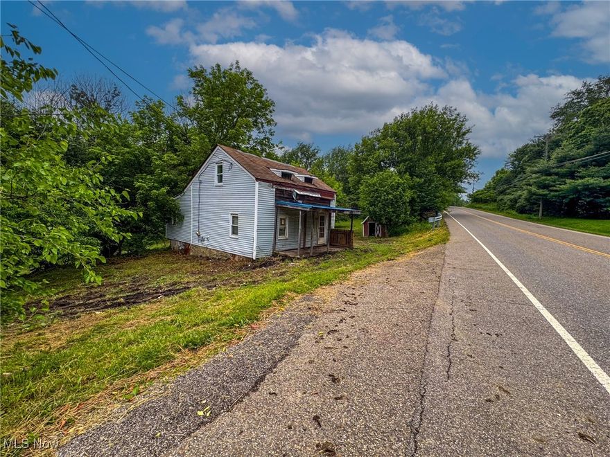 Online Only Auction 07/08/ 2025 Whether you're dreaming of building your forever home or looking for a rewarding renovation project, this charming 3-bedroom, 1-bath home is full of potential and set on a beautiful 3-acre lot in a serene country setting. features a wooded area—perfect for enjoying wildlife and added privacy. Enjoy peace, privacy, and the simple pleasures of rural life, complete with fruit trees, it has private well and septic system, and plenty of space to grow, garden, or expand.  This property offers the perfect balance of accessibility, space, and natural beauty. Located minutes from Canton, Navarre, Bolivar , and Interstate 77.  Feel free to walk the land at your convenience and risk and envision the possibilities. Open House Wednesday June 25th 4:00PM To 5:00PM