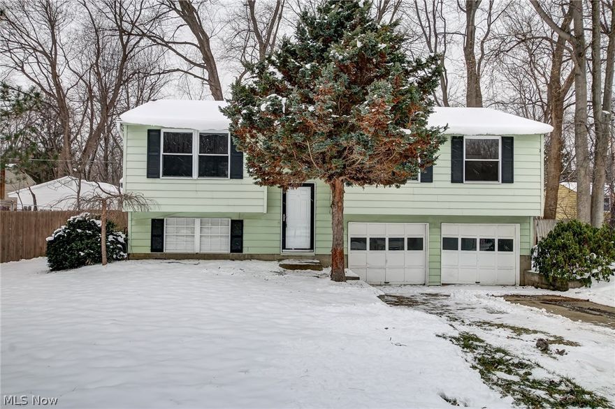 Move right into your updated spacious bi-level.  Three bedroom, one bath, featuring newer flooring throughout, freshly painted throughout.  Private yard with deck, close to parks and Lake Erie.  Brand new appliances, fridge, range, oven, dishwasher.  Built in microwave. Roof 2004, furnace 2002.