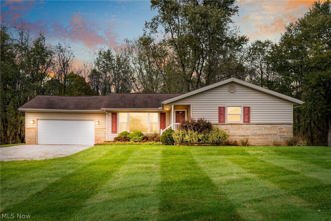 Welcome home! This adorable, cozy ranch home is nicely situated on 1.45 acres of land with a driveway long enough to separate from the road & give more privacy. As you make your way through the door, you are greeted by a nice sized living room, a dining area with a brand new sliding glass door that opens to a deck area that is perfect for party hosting or escaping to watch nature come through the backyard. The bedrooms are all decent sized & the master bedrooms has its own full master bathroom as well. The garage is attached, which makes it nice to bring in groceries when the weather isn't cooperating. The basement is not finished, but is set up & ready to hang drywall & add your own finishing touches. Improvements include the furnace (2019), brand new steel doors, 200 amp electric service, brand new carpet with 8lb padding underneath, new roof, new insulated vinyl siding, 8 to 10 inches of insulation above the living area, brand new garage door & so much more! Schedule your showing fo
