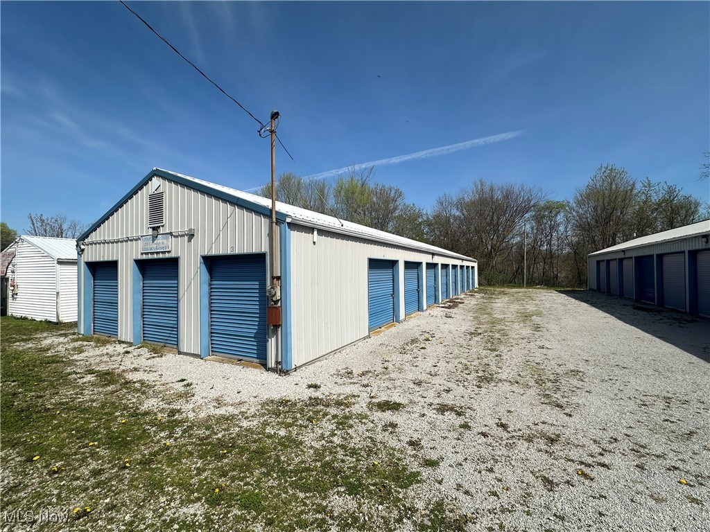 Auction will be conducted at the Marshallville Village Park
The real estate is located at 37 E. Church St., Marshallville OH 44645. The lot size is 0.7 acres and there are 2 storage unit buildings. One is 24’X96’ and the other is 24’X90’. There are 38 total rental units. The breakdown is 14 units are 5’X6’, 8 units are 10’X12’, 7 units are 12’X20’, 8 units are 12’X24’ and one that is 12’X28’. Current income per unit ranges from $50 to $100. Taxes will be prorated to the day of closing and currently are $1,823.30 per year. A great Absolute Auction investment opportunity.
Properties sell at Absolute Auction so be prepared! There are no financing contingencies. There is also No Buyer’s Premium. We require a 10% of purchase price non-refundable down payment due the day of auction with the balance due at closing in approx. 30 days. Taxes will be prorated to the day of closing. Announcements sale day take precedence over printed material.