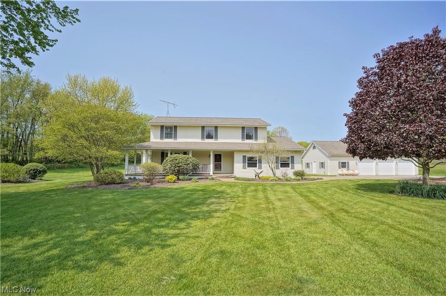 Welcome to 6885 Red Brush, located less than a mile from the Portage County Bike & Hike Trail! Enter via a full concrete driveway to the home and detached 4 car heated garage. The rolling landscape behind the home extends to a tree line where the 2nd half of the property extends back and is fully wooded and abuts to Towner's Woods! 2 apple trees, a pear tree and a peach tree that produce fruit each year will be found in the front and back yards along with a shed in the back yard. Relax and enjoy the serenity of the wrap around front porch. Great space for napping, bird watching or gathering with family and friends. For main floor living, a large family room with wood fireplace and gas starter is at the rear of the home overlooking the backyard. Bose surround sound speaker system conveys. An office adjacent to the kitchen opens to the back deck. Upstairs, brand new carpet in the master bedroom in March 2023 along with fully renovated master bath as well as the 2nd full bath, also fully