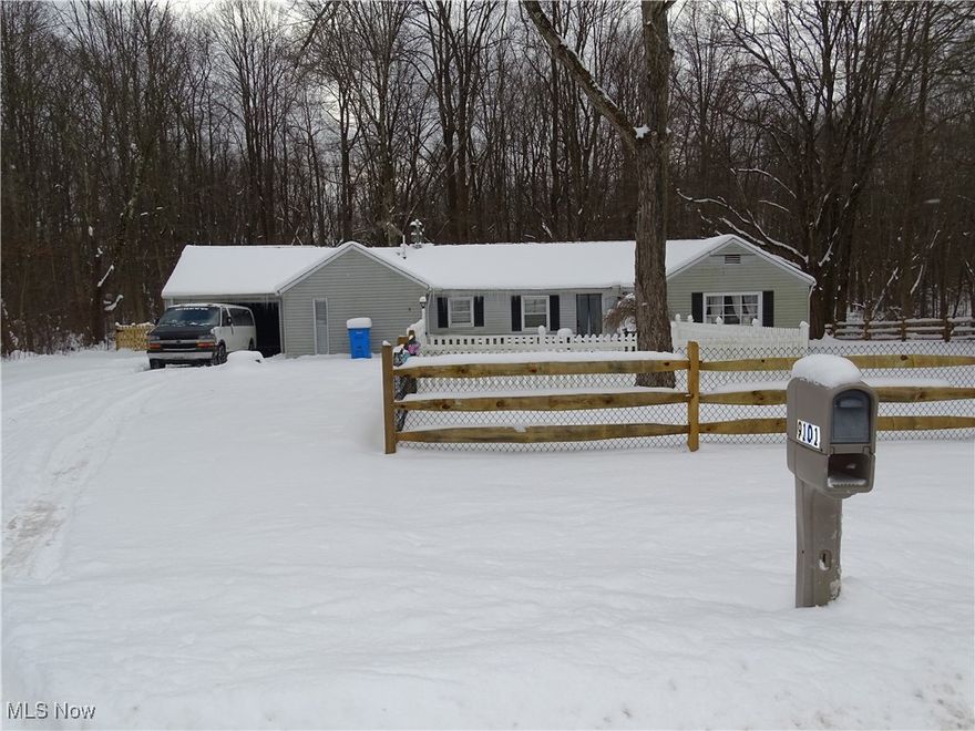 Discover the perfect cozy retreat tucked away on nearly 3 serene acres across two parcels in Chesterland.  This charming 1953 ranch is a delightful blend of comfort and tranquility, offering a peaceful country lifestyle that just feels like home.  With 3 inviting bedrooms and 1 well appointed bath (1,446 sq. ft), this lovingly maintained residence features a new roof (2024), and a new high-efficiency furnace for year-round comfort.  The updated kitchen, complete with modern cabinets and appliances, is a culinary haven, and it seamlessly opens up to a lovely patio that's ideal for summer barbecues, morning coffee, or simply soaking in the breathtaking sunsets.  The picturesque yard is made even ore special with the newly installed split rail fence (2025) that ensures playtime is safe for both children and pets.  Plus, the attached one-car garage with grid flooring and an outdoor storage shed provide ample space for all your tools and hobbies.  Embrace the charm and warmth of this delightful home, where comfort meets country living.