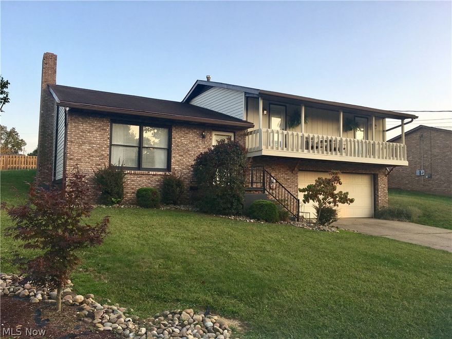 You're really going like this freshly painted house in a great neighborhood, but you'll LOVE the big, flat backyard! This 3 BR, 2BA brick and vinyl home features a huge, partially fenced back yard with patio, fire pit, storage shed and room to play. The front of the house has a great balcony accessible from two of the bedrooms. The kitchen and dining room overlook the living room and there's a private family room with wood burning fireplace in the basement. Lots of garage space too!