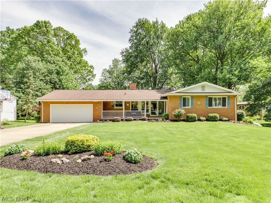 Spacious 3 bedroom, 3 bath all brick Ranch on manicured lot. Vaulted living and dining room with corner wood burning fireplace and new flooring 2016.  Updated kitchen with granite counter tops, pantry and all appliances with eating area. Master suite has double closet and updated private bath in 2014. Guest bath has jetted tub. Vaulted Family room with fireplace and slider to rear deck overlooking lush yard. Daylight windows highlight the recreation room and billiards area that features fireplace, dry bar and has a full bath, laundry room and plenty of storage. Pool table and ping pong tables stay. Recent updates include 30 year roof done in 2004, new furnace and A/C 2012, windows 2002. 2 car attached garage with hot & cold water. Owner is providing a one year home warranty to the new​​‌​​​​‌​‌​​​‌‌​​​‌‌‌​​‌​​‌‌​​​​ buyers.