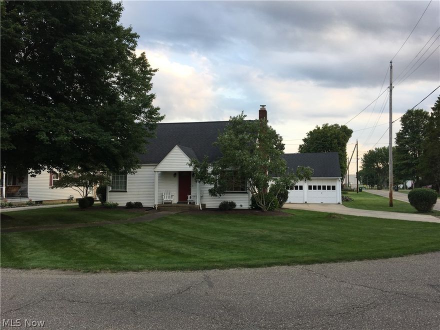 Charming 4 bedroom, 2 bath cape cod.  Tastefully decorated with freshly painted interior.  Brick gas fireplace in the living room.  Updated kitchen with Granite counter tops and ceramic tile backsplash.  Updated first floor full bath with ceramic tile shower surround and solid surface counters.  Enclosed rear porch with ceramic tile floors and covered patio.  Replacement windows.  New roof in 2009+/-.  2 car detached garage with 1 opener.  Move in condition.  Must see!  Current owner pays average of $75 gas,  $80 electric and $37 for water and sewer monthly.  Exclude swing set.